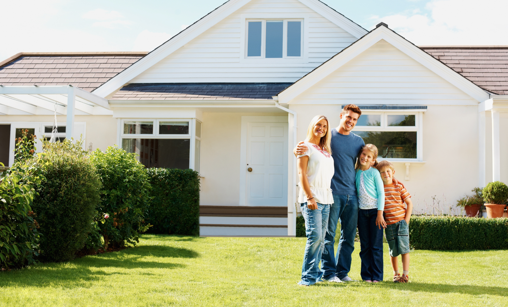 Family in front of a home